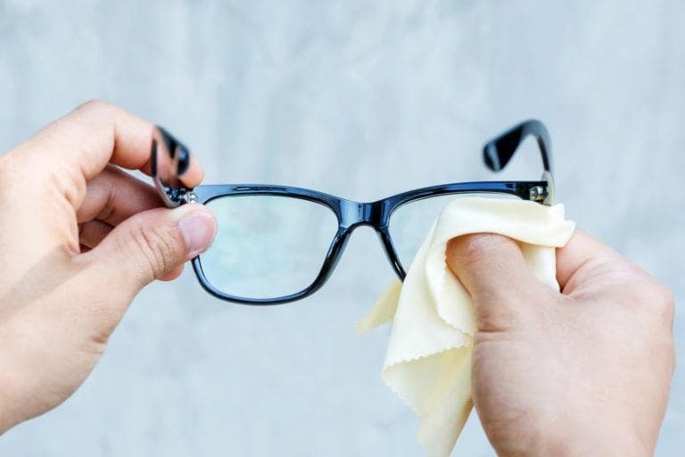How to Clean Glasses Between the Lenses and Frames